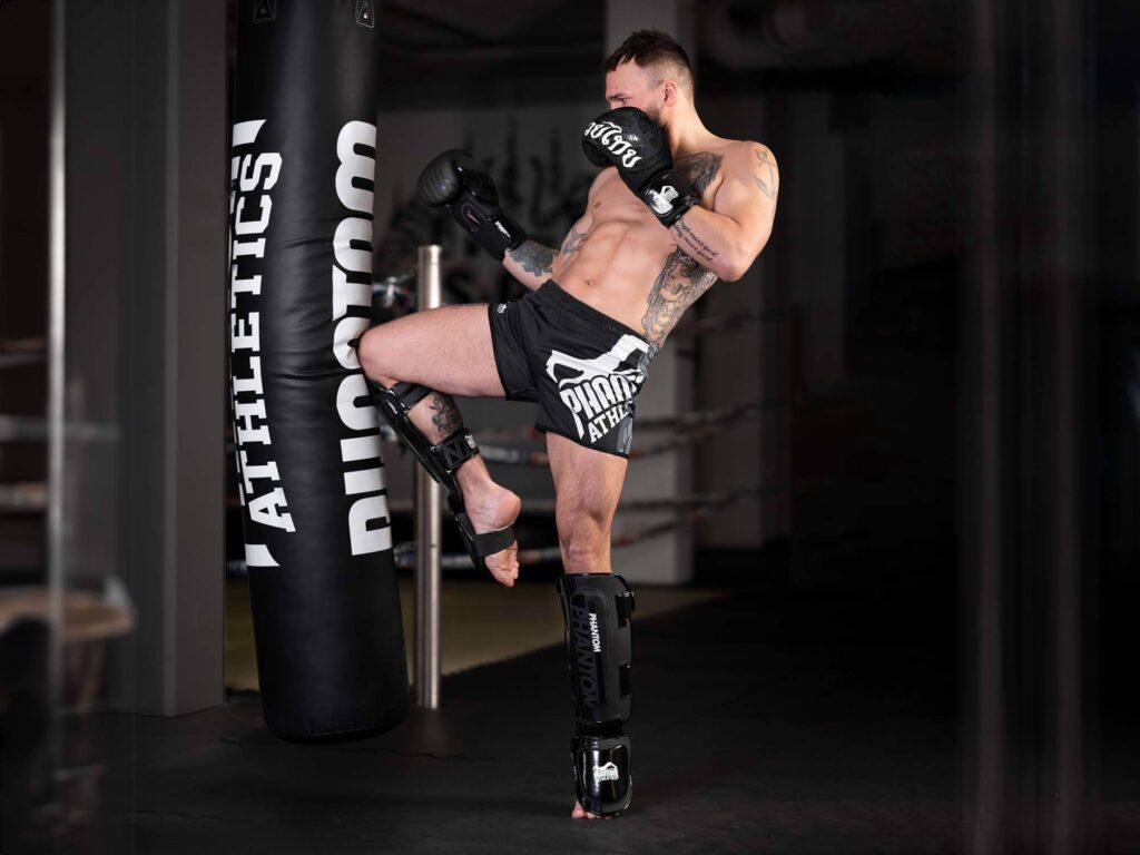 MuayThai Fighter Heavy Bag Training